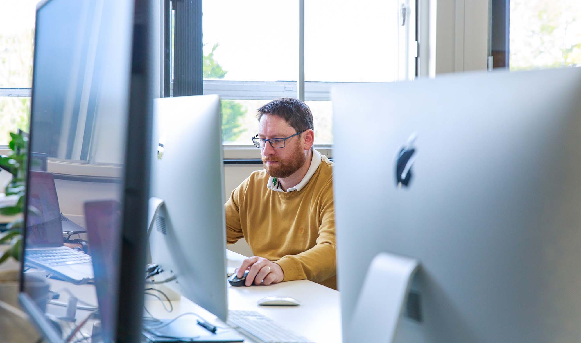 Scott working at desk